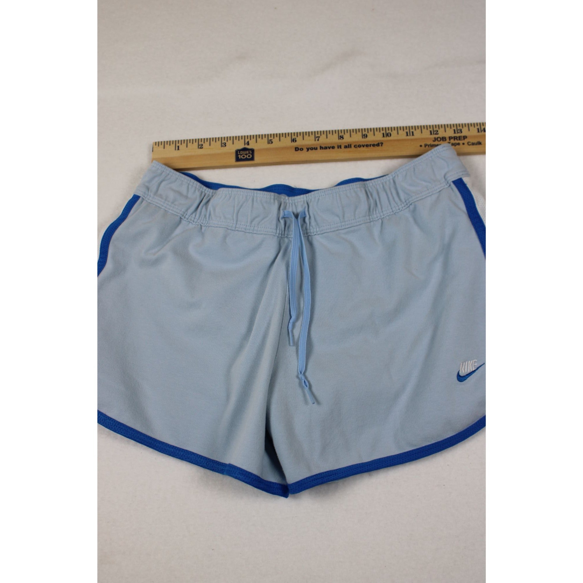 Nike Womens Light Blue Running Shorts With Blue Trim Elastic Waist And Drawstring Size M
