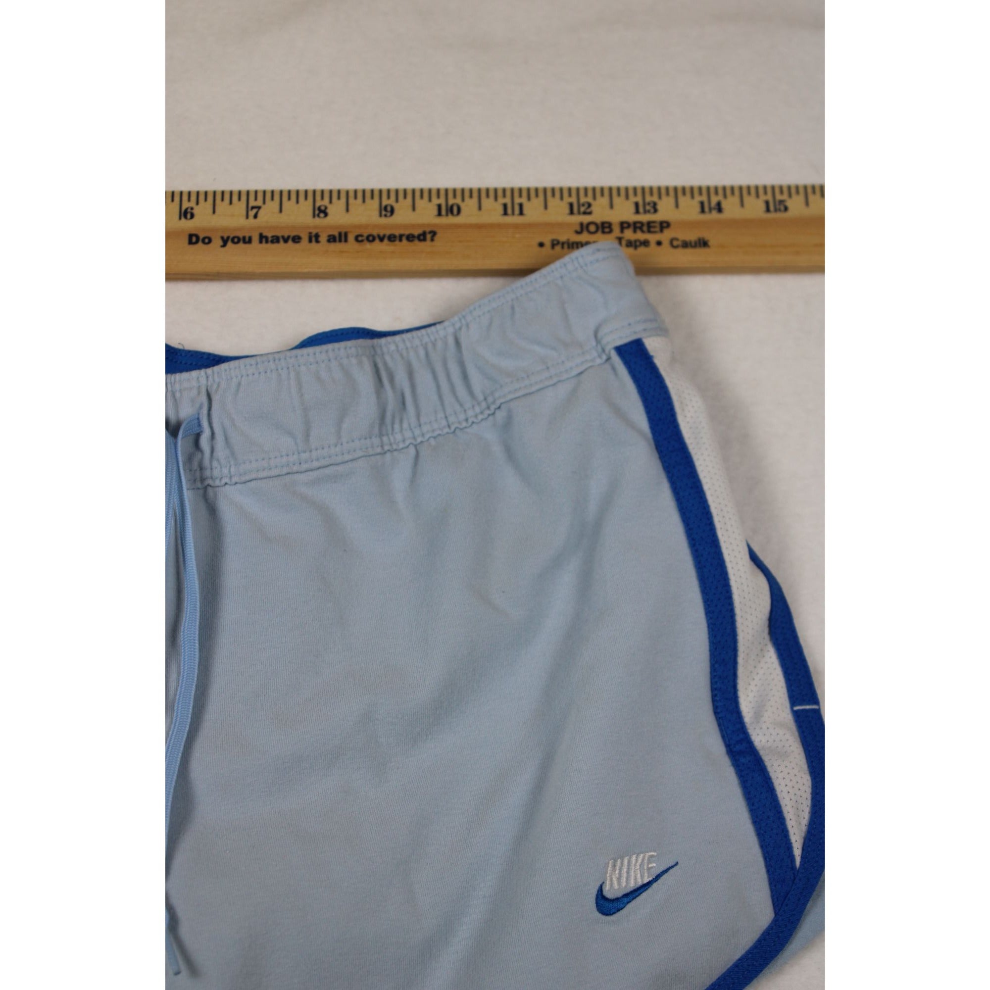 Nike Womens Light Blue Running Shorts With Blue Trim Elastic Waist And Drawstring Size M