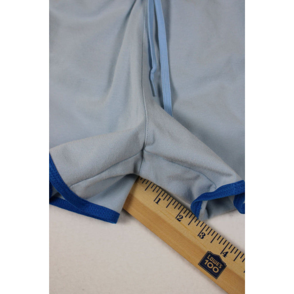 Nike Womens Light Blue Running Shorts With Blue Trim Elastic Waist And Drawstring Size M