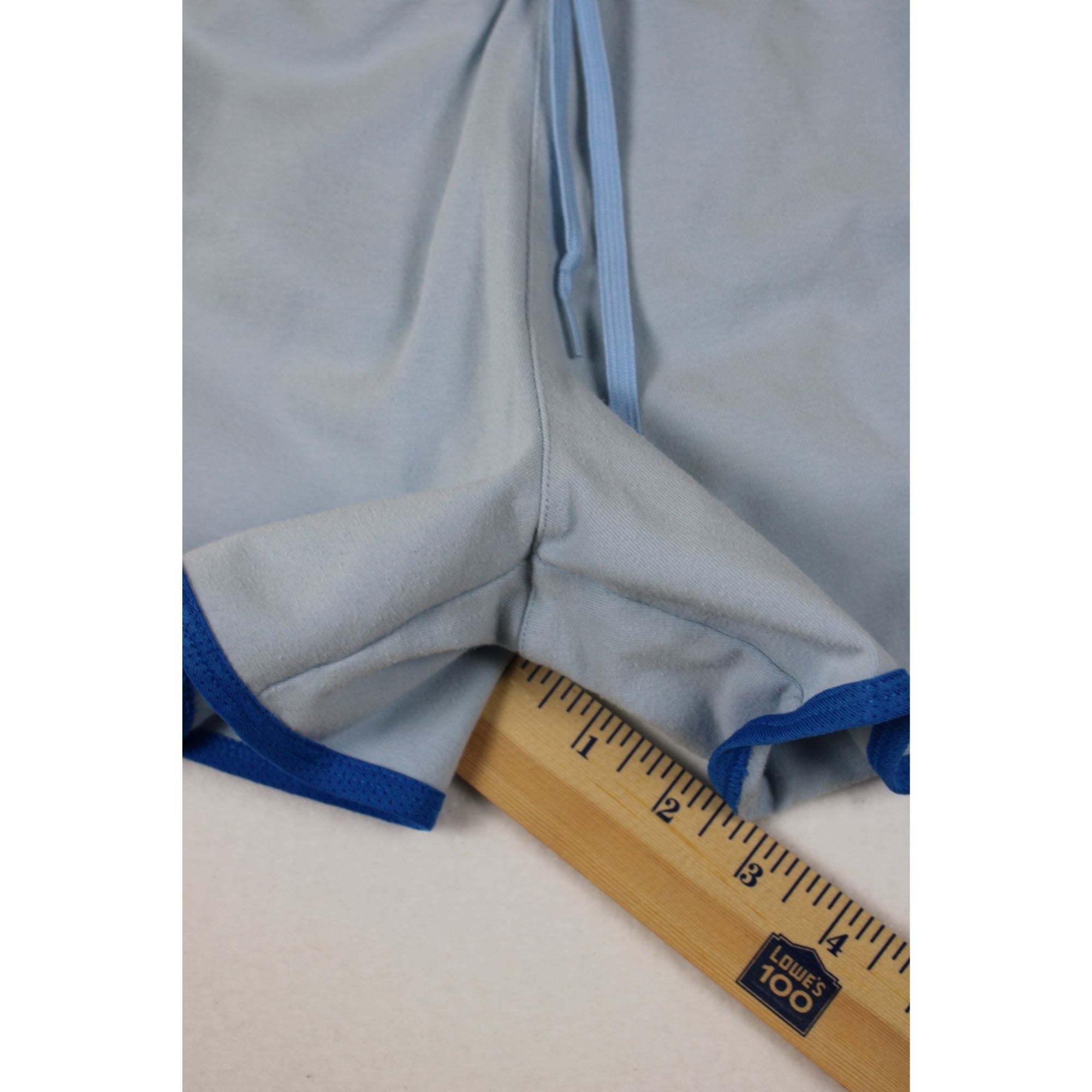 Nike Womens Light Blue Running Shorts With Blue Trim Elastic Waist And Drawstring Size M